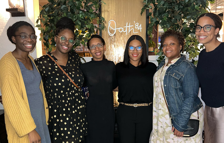Six women standing side by side representing women in medicine.