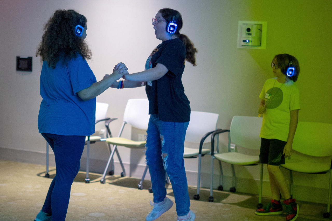 Kids dancing with headphones