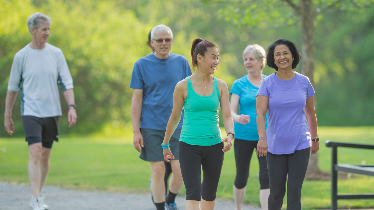 Adults exercising outdoors