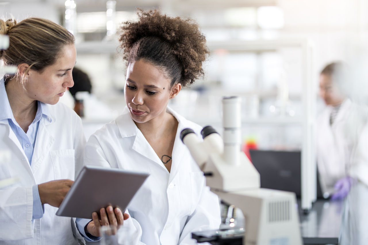 researchers viewing iPad