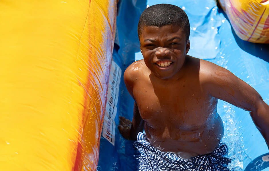 22q patient. Boy on a water slide. 22q patient. Boy on a water slide.