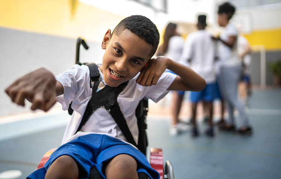 Middle school-aged boy with special needs who uses wheelchair