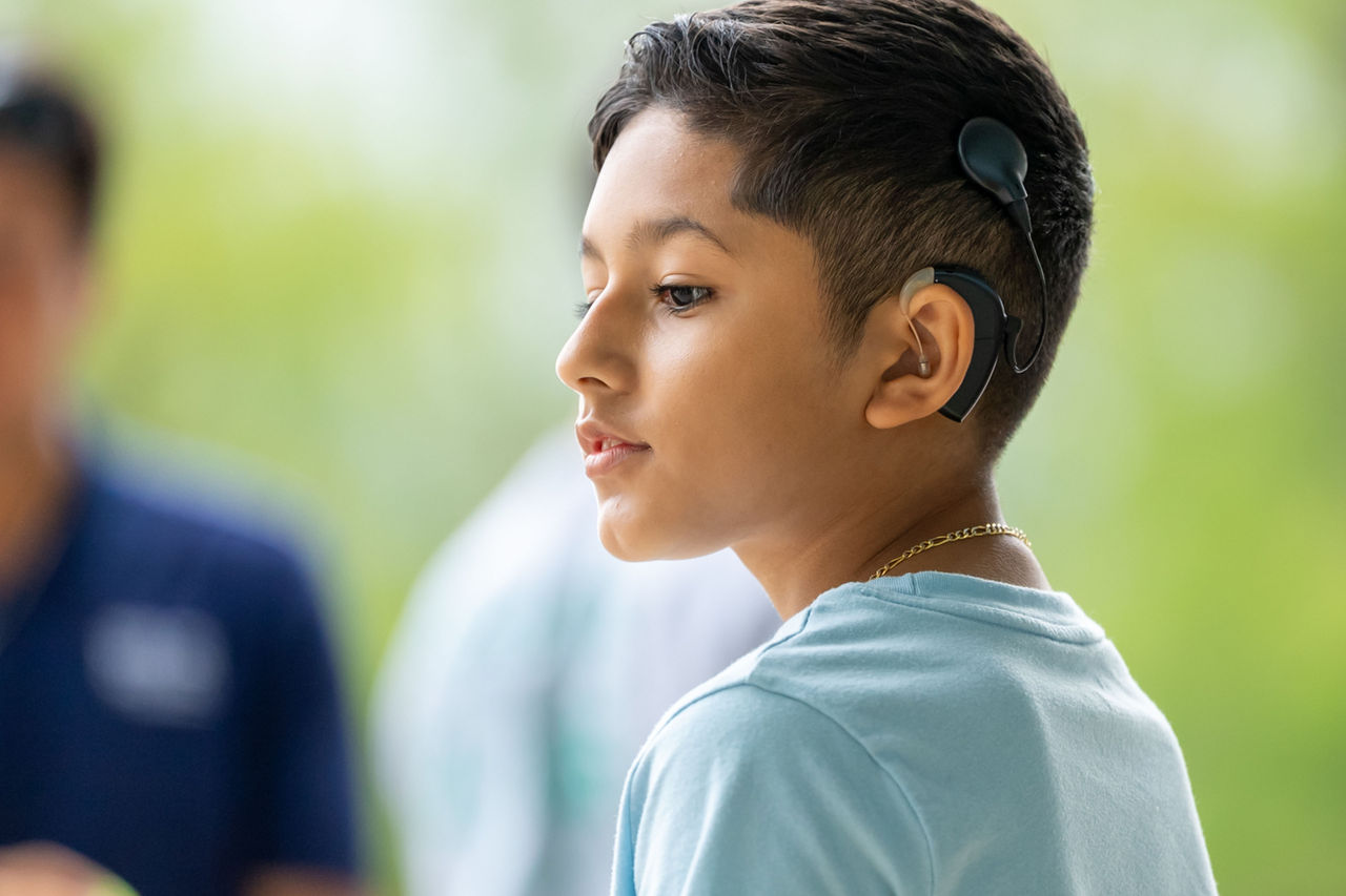 Boy with a cochlear implant