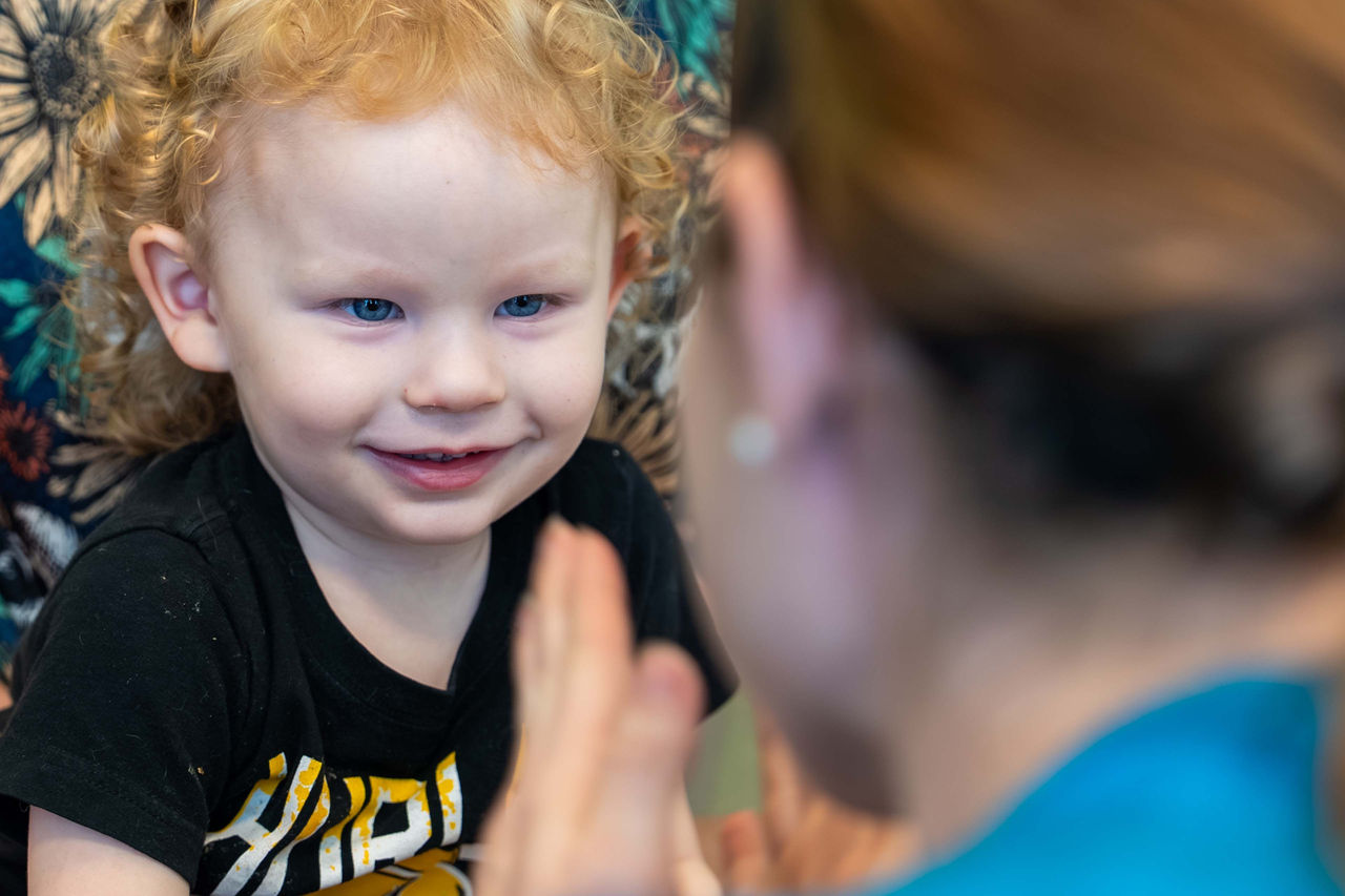 Therapist working with child