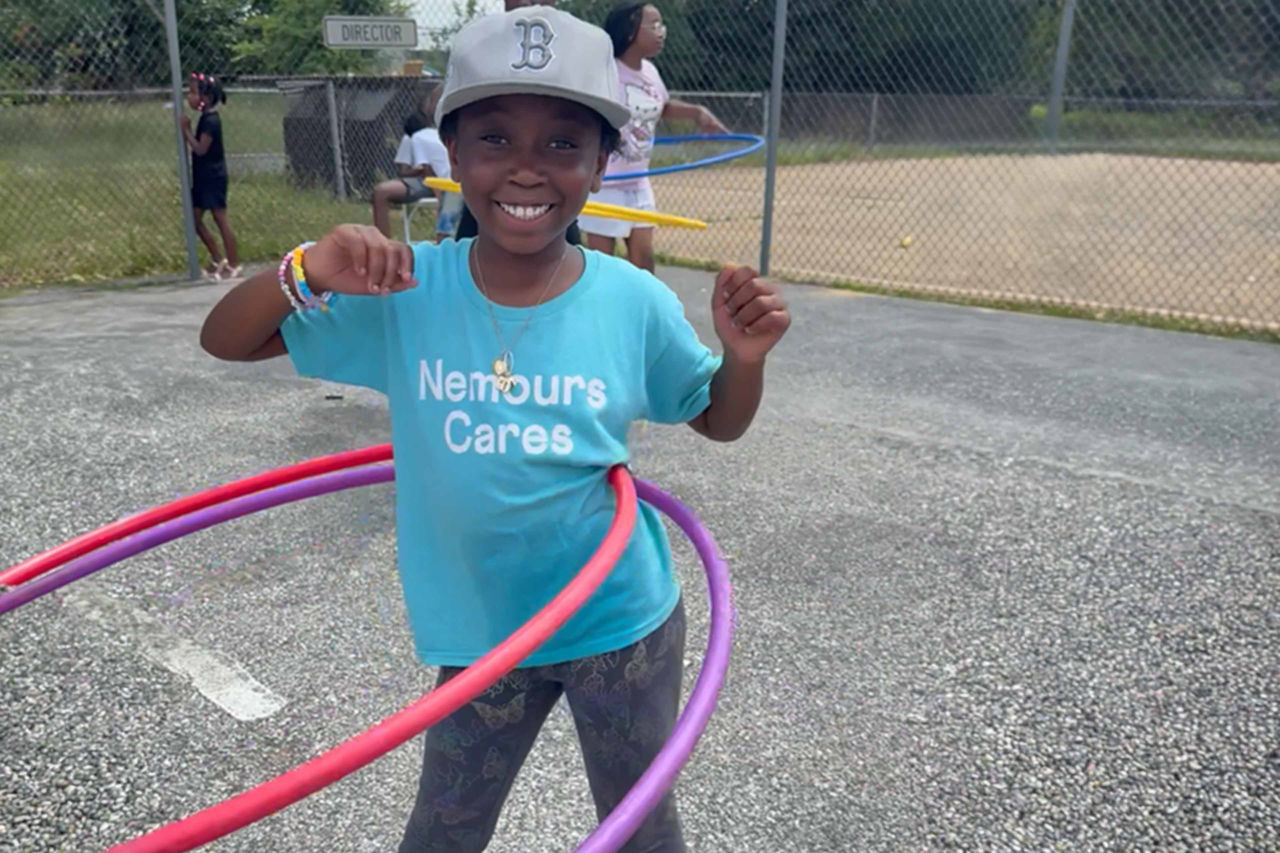 Young girl hula hooping