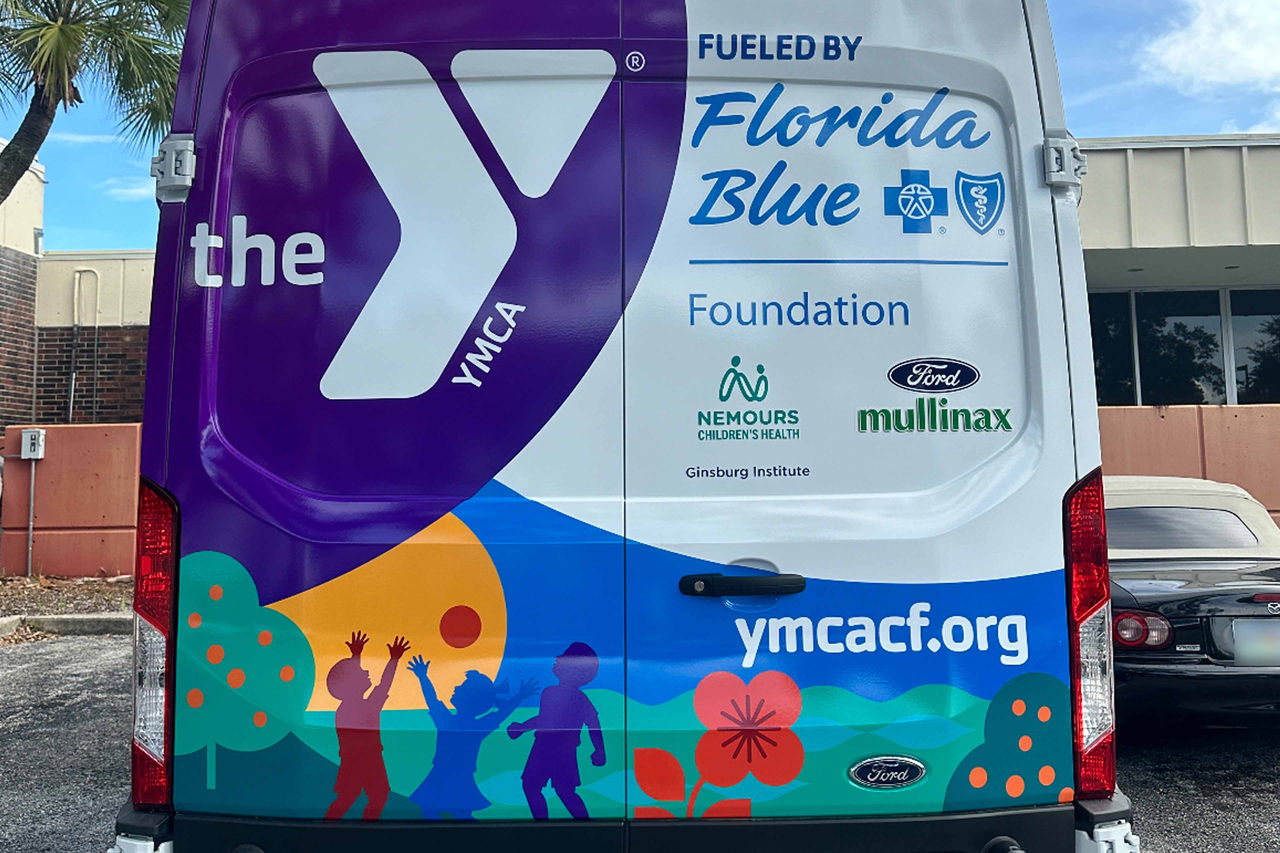 The Y on the Fly van brings fun, movement, and healthy activities directly to children, encouraging active play and wellness.)